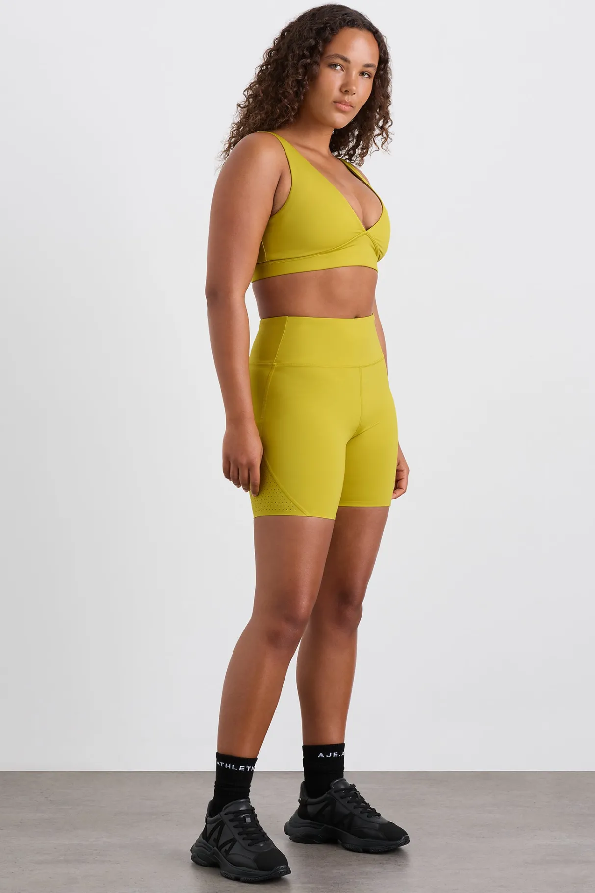 perforated_hem_mid_length_short__5.webp Flash Sale Aje ATHLETICA Perforated Hem Mid Length Short 601 Solar Blaze