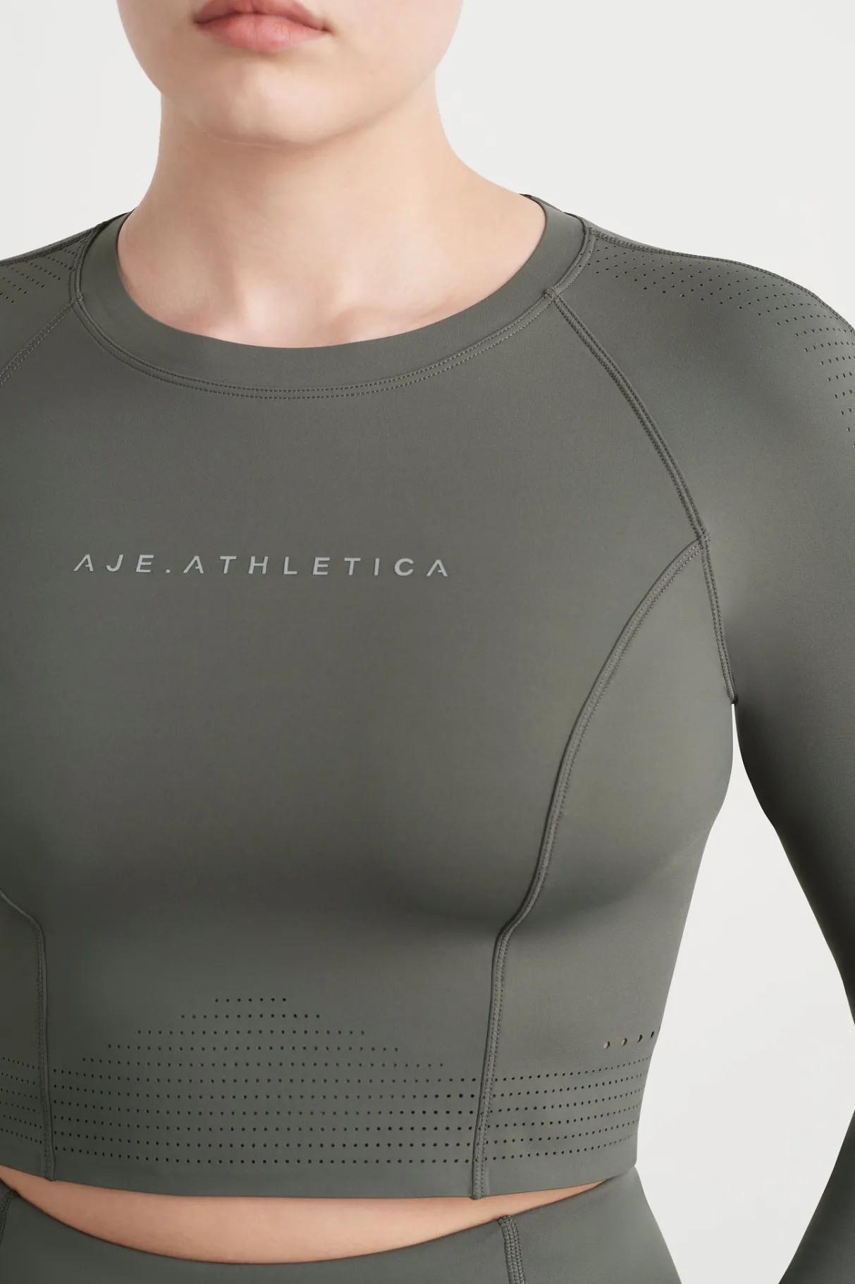 perforated_long_sleeve_crop_top__7.webp Sale Aje ATHLETICA Perforated Long Sleeve Crop Top 340 Midnight Grey/Reflective