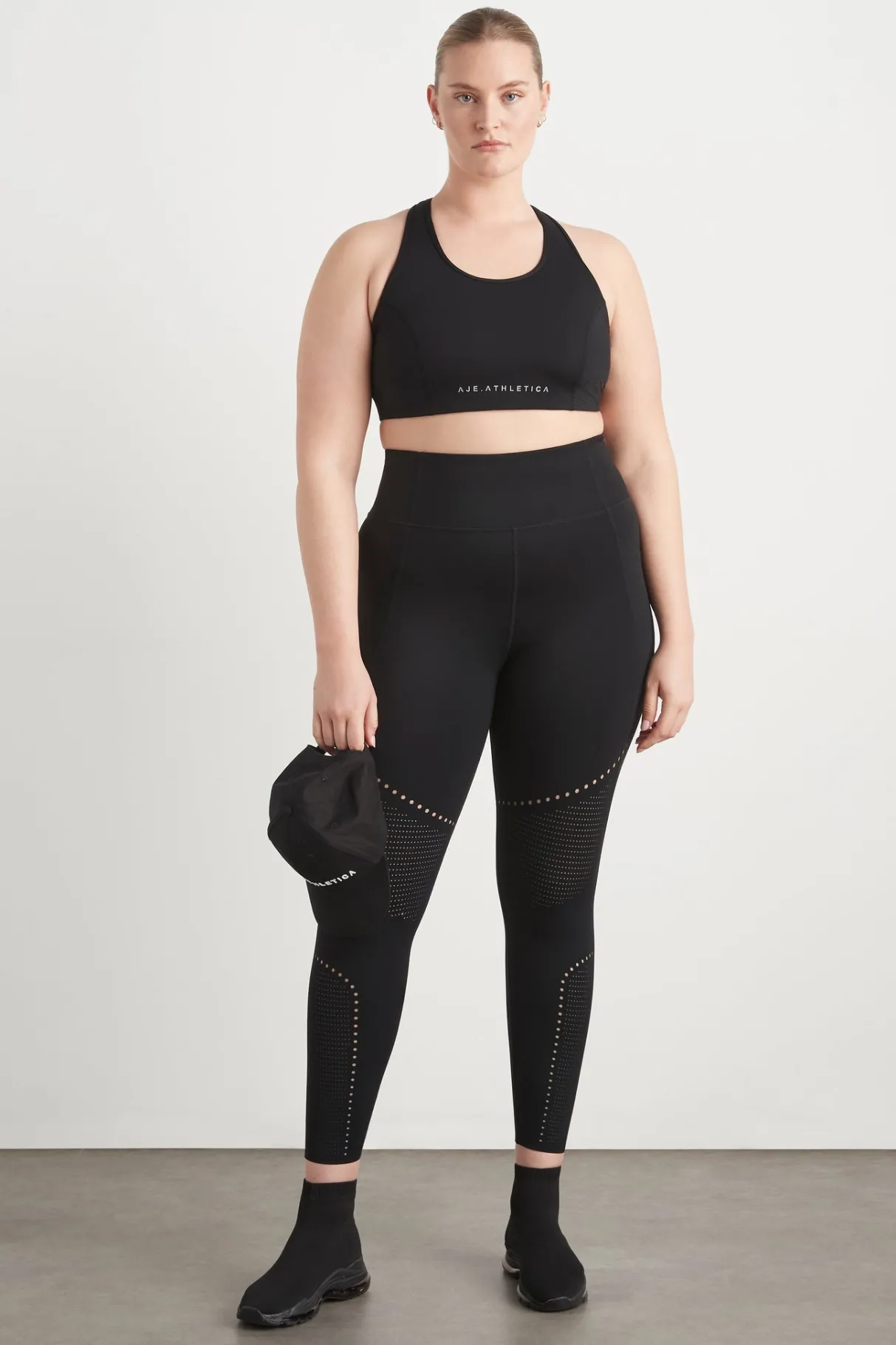 perforated_racer_sports_bra__10-1.webp Flash Sale Aje ATHLETICA Perforated Racer Sports Bra 339 Black/Reflective