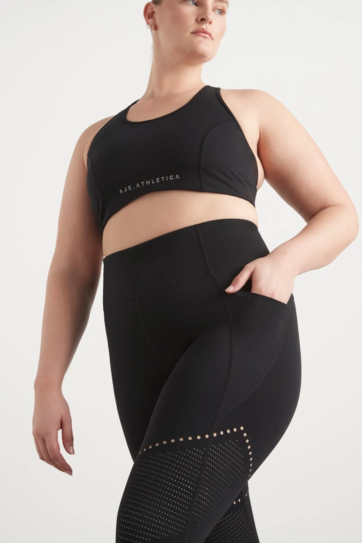perforated_racer_sports_bra__12-1.webp Flash Sale Aje ATHLETICA Perforated Racer Sports Bra 339 Black/Reflective