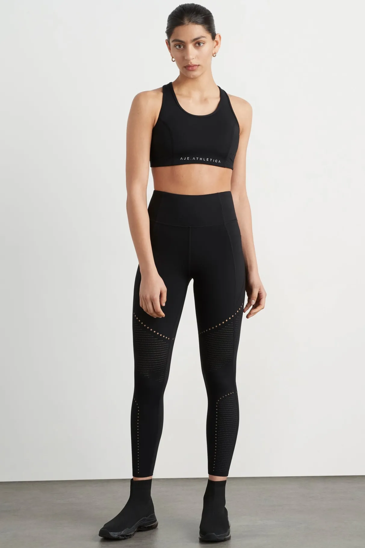 perforated_racer_sports_bra__2-1.webp Flash Sale Aje ATHLETICA Perforated Racer Sports Bra 339 Black/Reflective