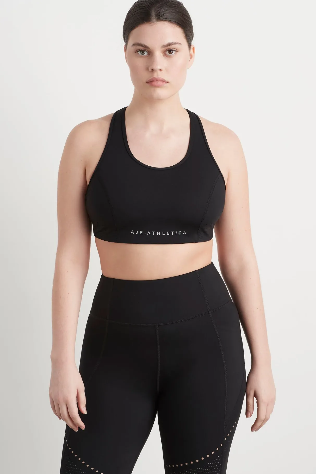perforated_racer_sports_bra__5-1.webp Flash Sale Aje ATHLETICA Perforated Racer Sports Bra 339 Black/Reflective