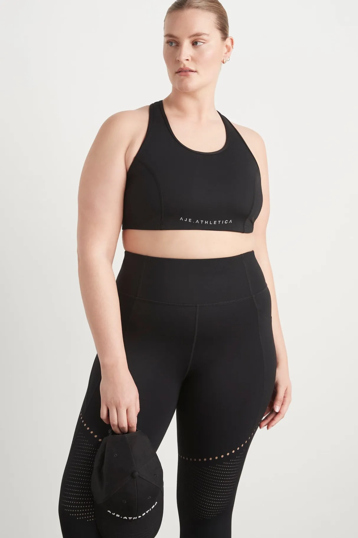 perforated_racer_sports_bra__9-1.webp Flash Sale Aje ATHLETICA Perforated Racer Sports Bra 339 Black/Reflective