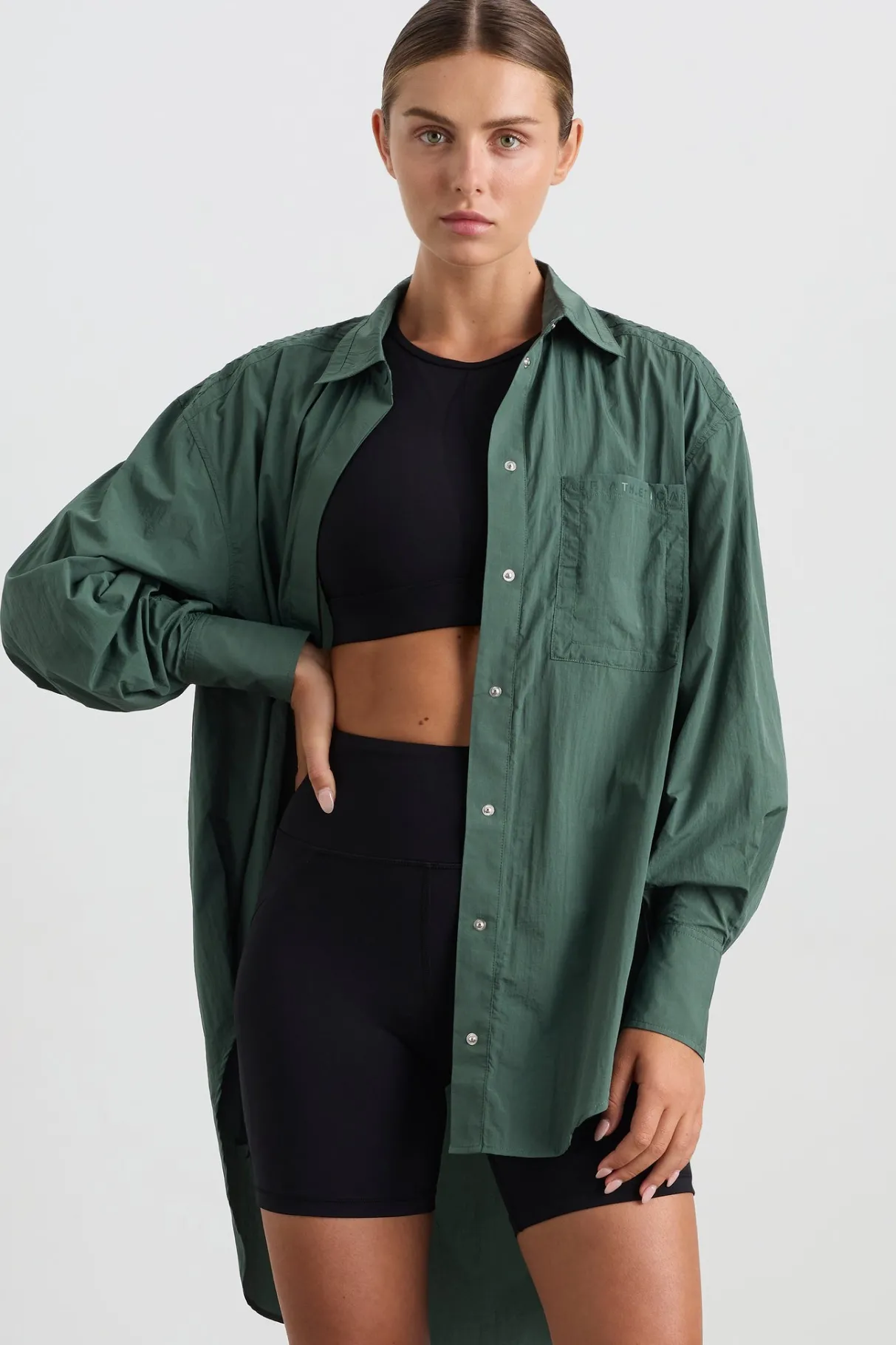 perforated_spray_shirt__0.webp Store Aje ATHLETICA Perforated Spray Shirt 406 Moss Green