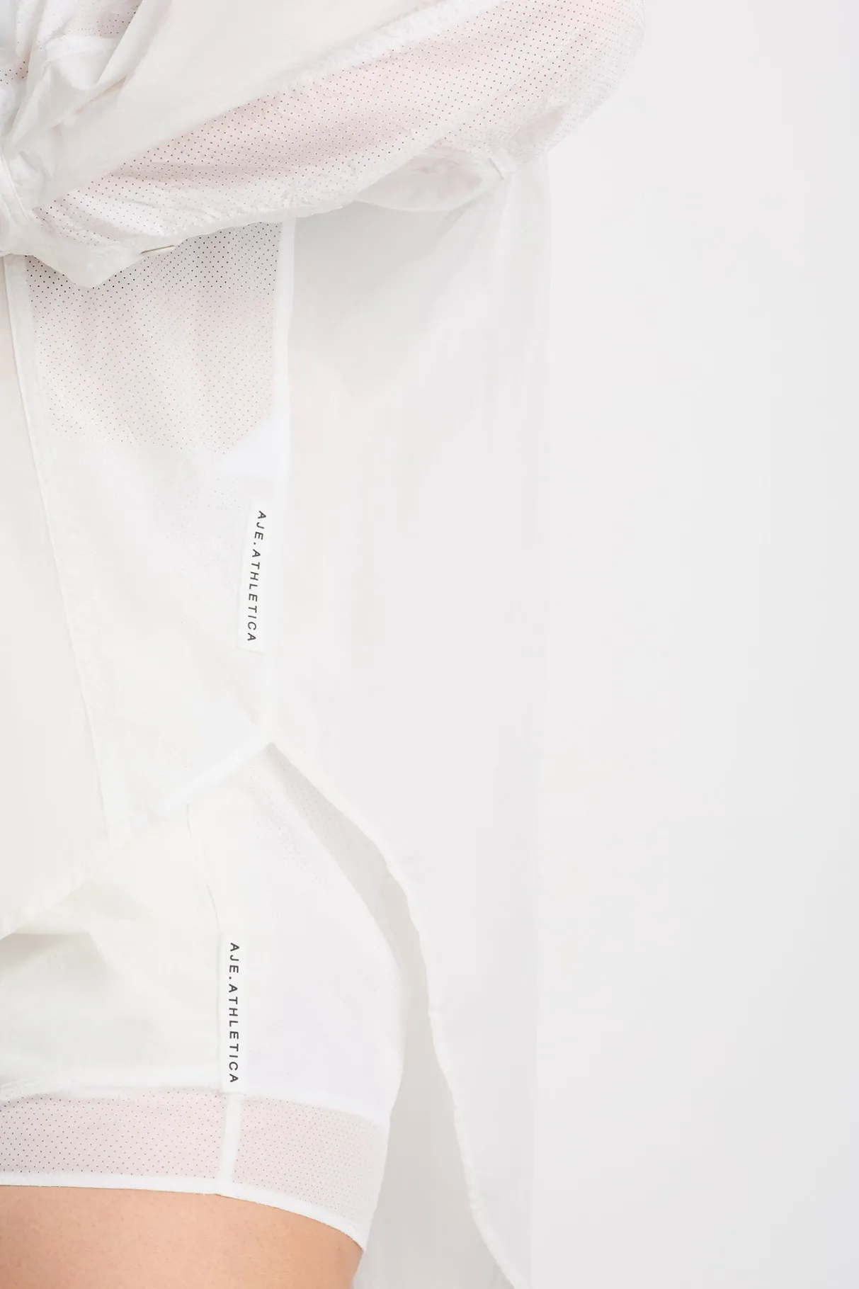 perforated_spray_shirt__12-1.webp Flash Sale Aje ATHLETICA Perforated Spray Shirt 406 White