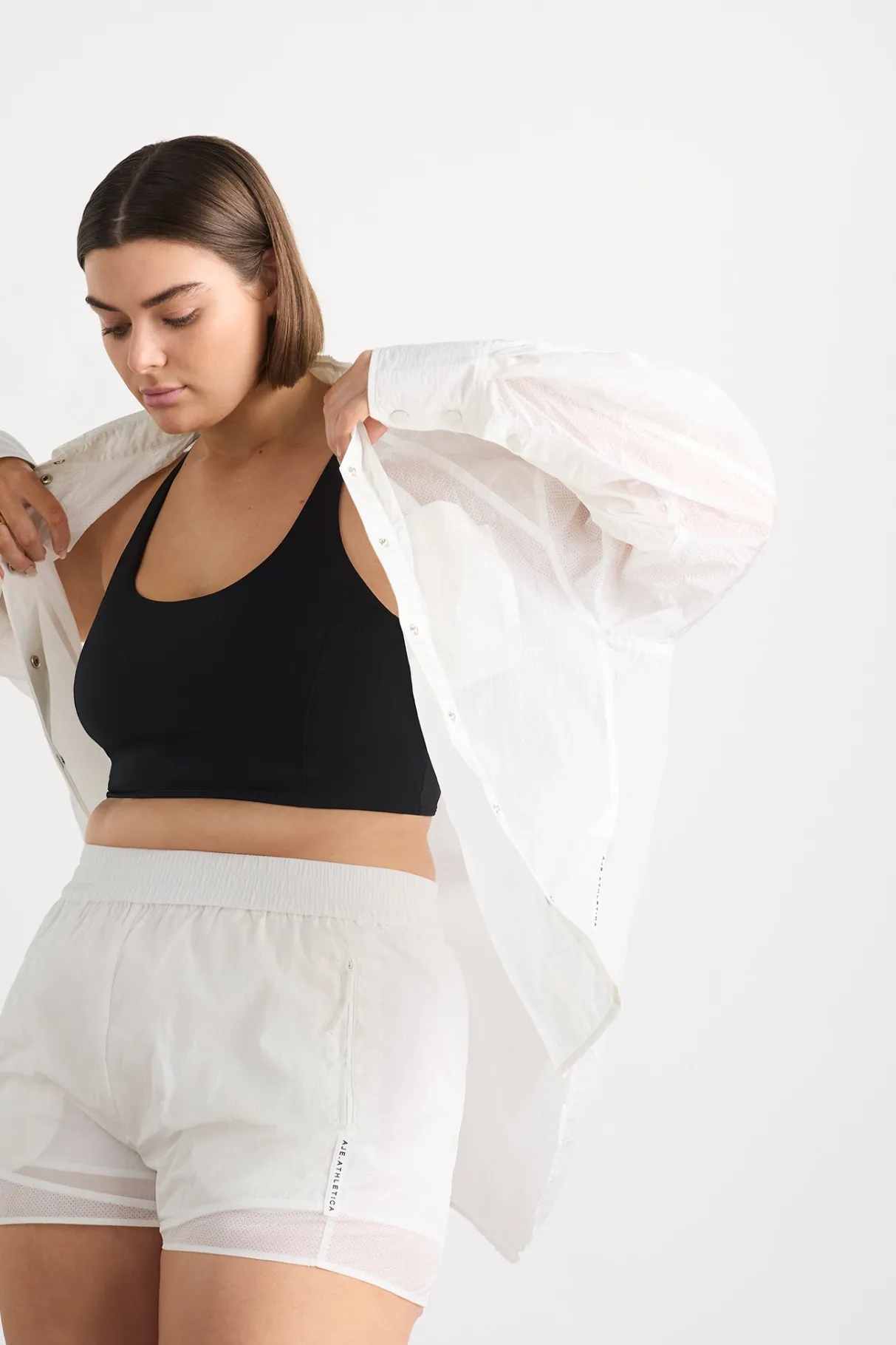 perforated_spray_shirt__13-1.webp Flash Sale Aje ATHLETICA Perforated Spray Shirt 406 White