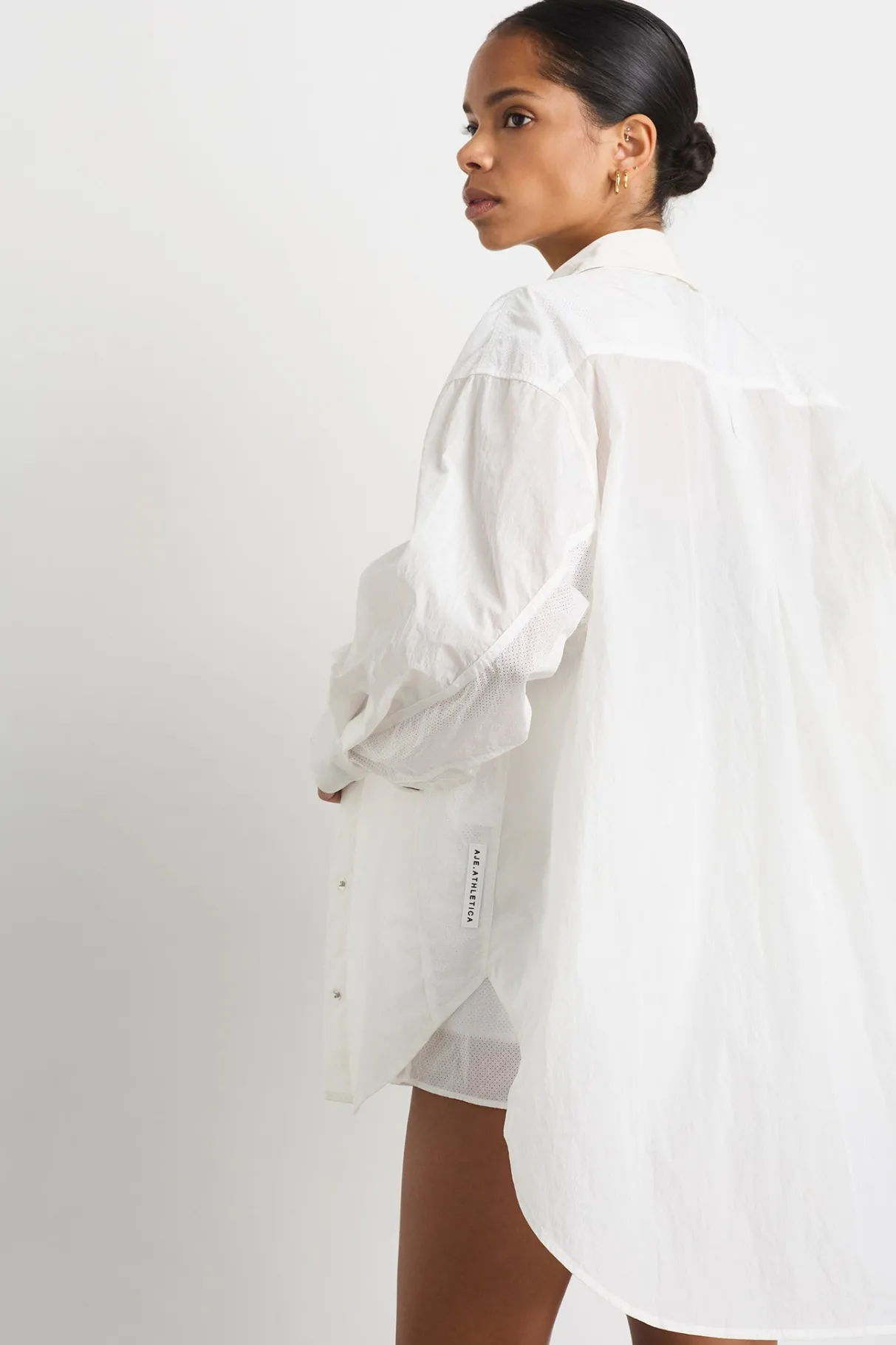 perforated_spray_shirt__4-1.webp Flash Sale Aje ATHLETICA Perforated Spray Shirt 406 White