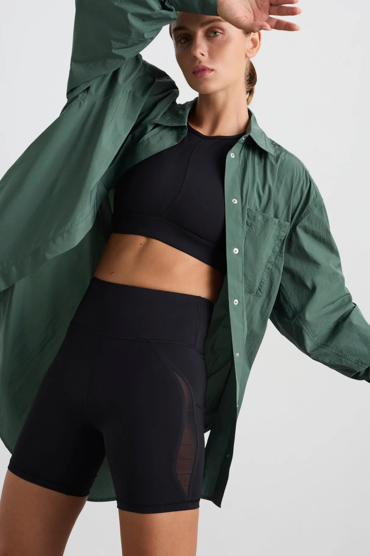 perforated_spray_shirt__4.webp Store Aje ATHLETICA Perforated Spray Shirt 406 Moss Green