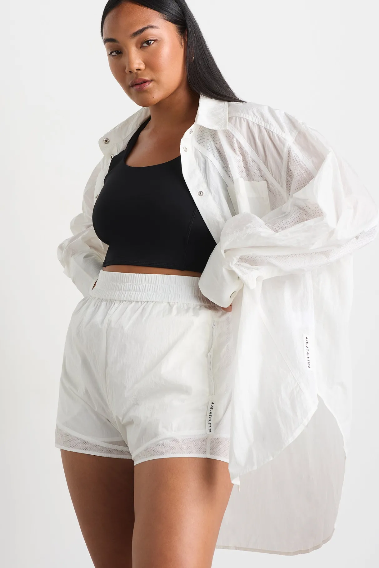 perforated_spray_shirt__6-1.webp Flash Sale Aje ATHLETICA Perforated Spray Shirt 406 White