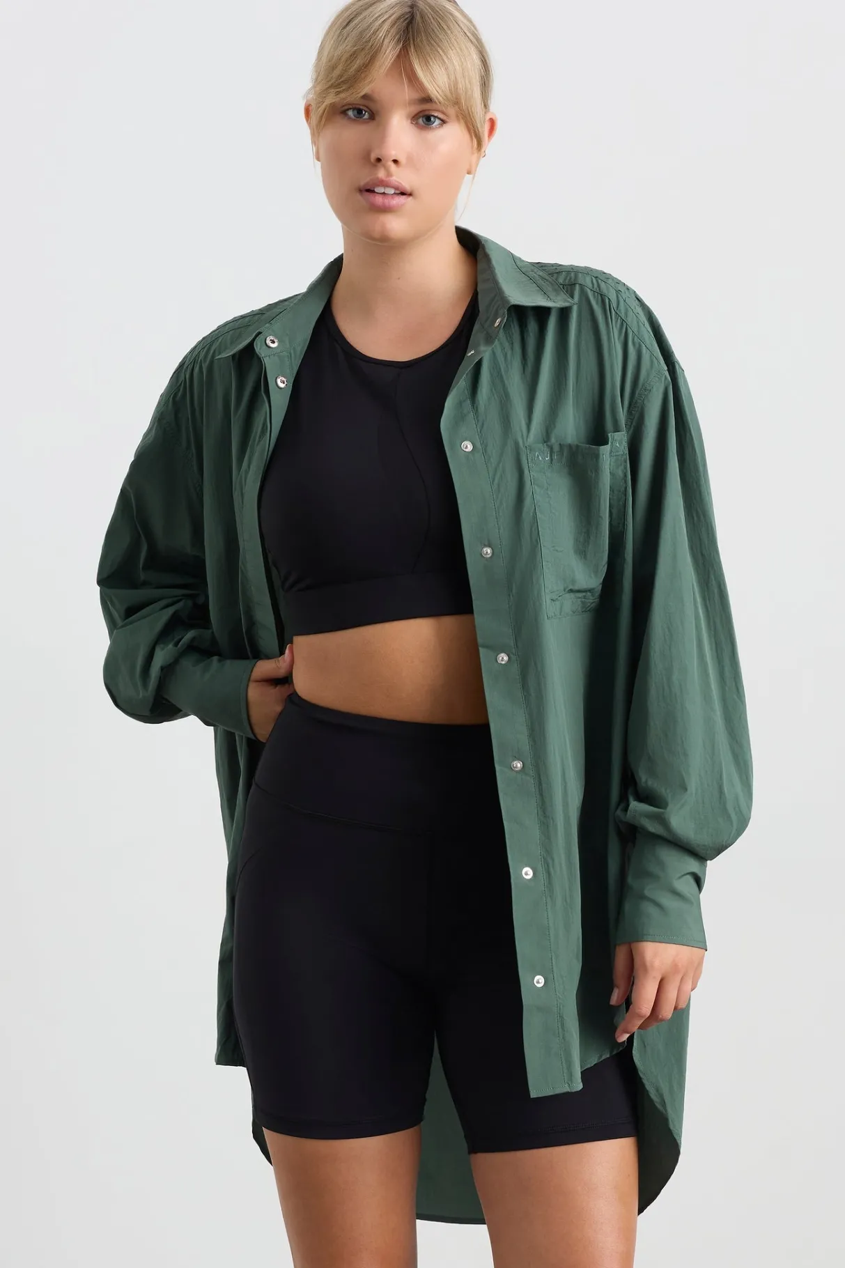 perforated_spray_shirt__6.webp Store Aje ATHLETICA Perforated Spray Shirt 406 Moss Green