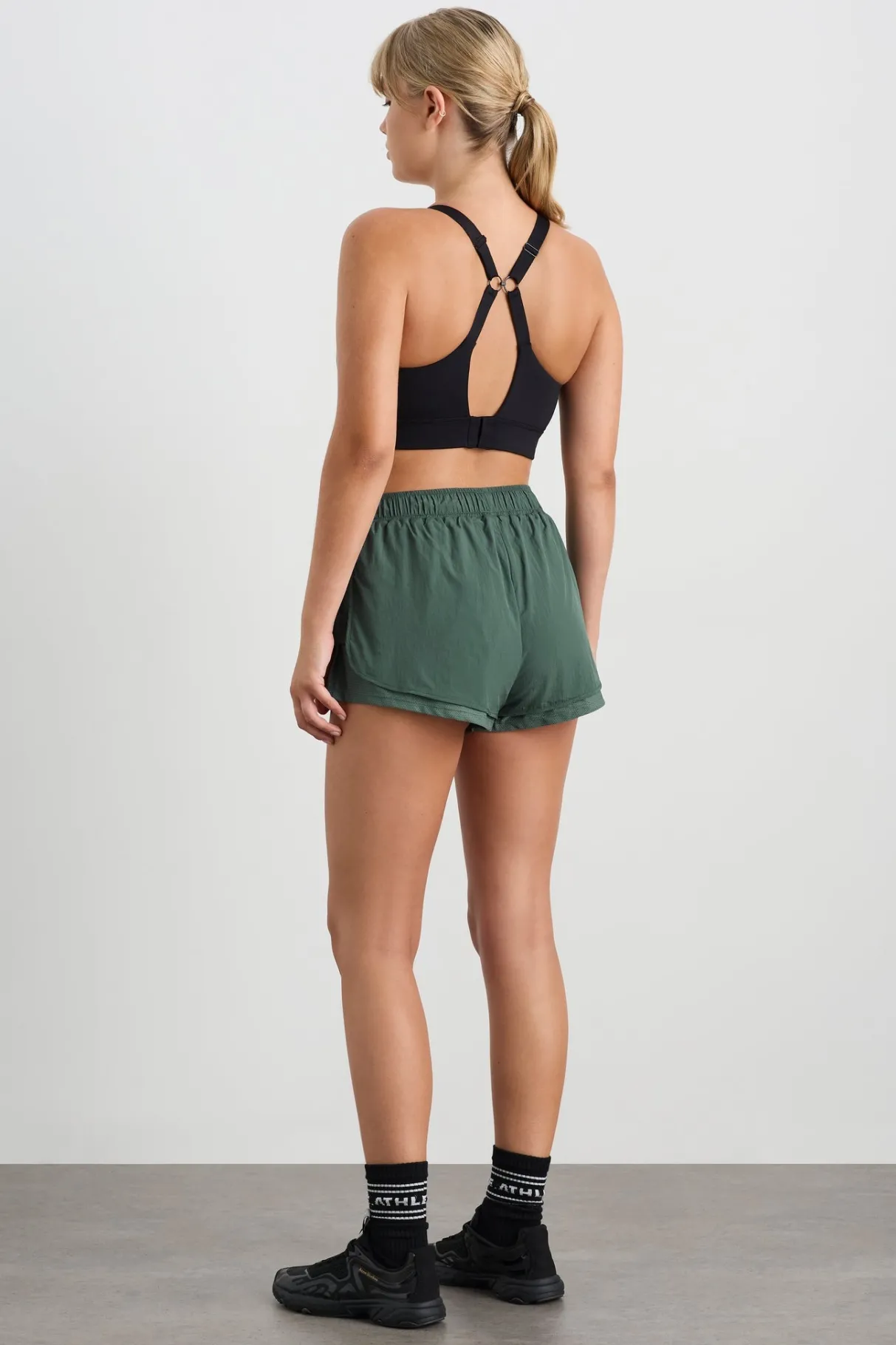 perforated_spray_shorts__10.webp Shop Aje ATHLETICA Perforated Spray Shorts 019 Moss Green