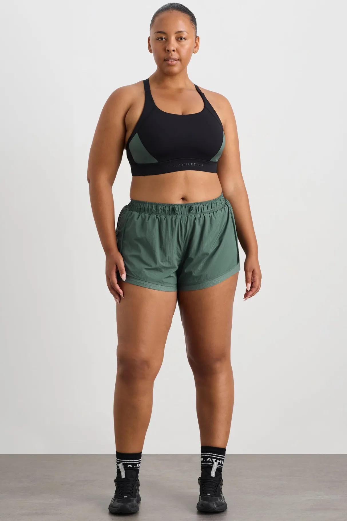 perforated_spray_shorts__11.webp Shop Aje ATHLETICA Perforated Spray Shorts 019 Moss Green