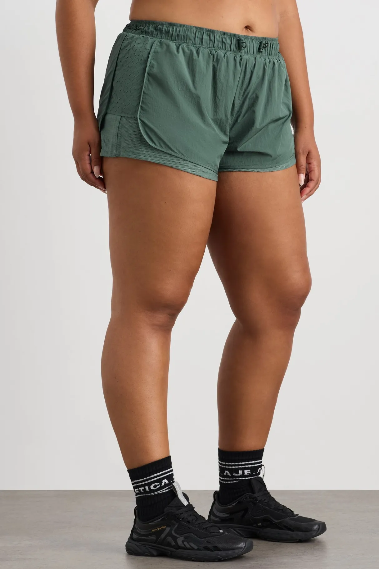 perforated_spray_shorts__12.webp Shop Aje ATHLETICA Perforated Spray Shorts 019 Moss Green