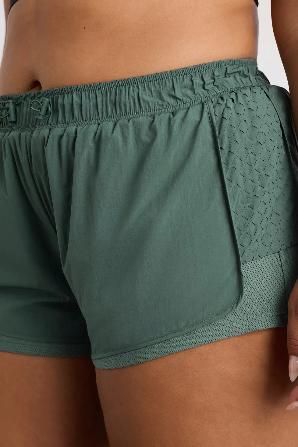 perforated_spray_shorts__13.webp Shop Aje ATHLETICA Perforated Spray Shorts 019 Moss Green