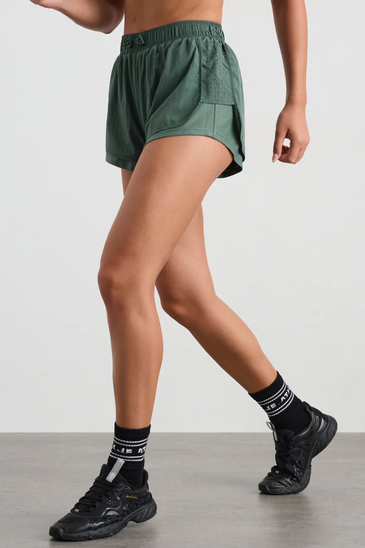perforated_spray_shorts__2.webp Shop Aje ATHLETICA Perforated Spray Shorts 019 Moss Green