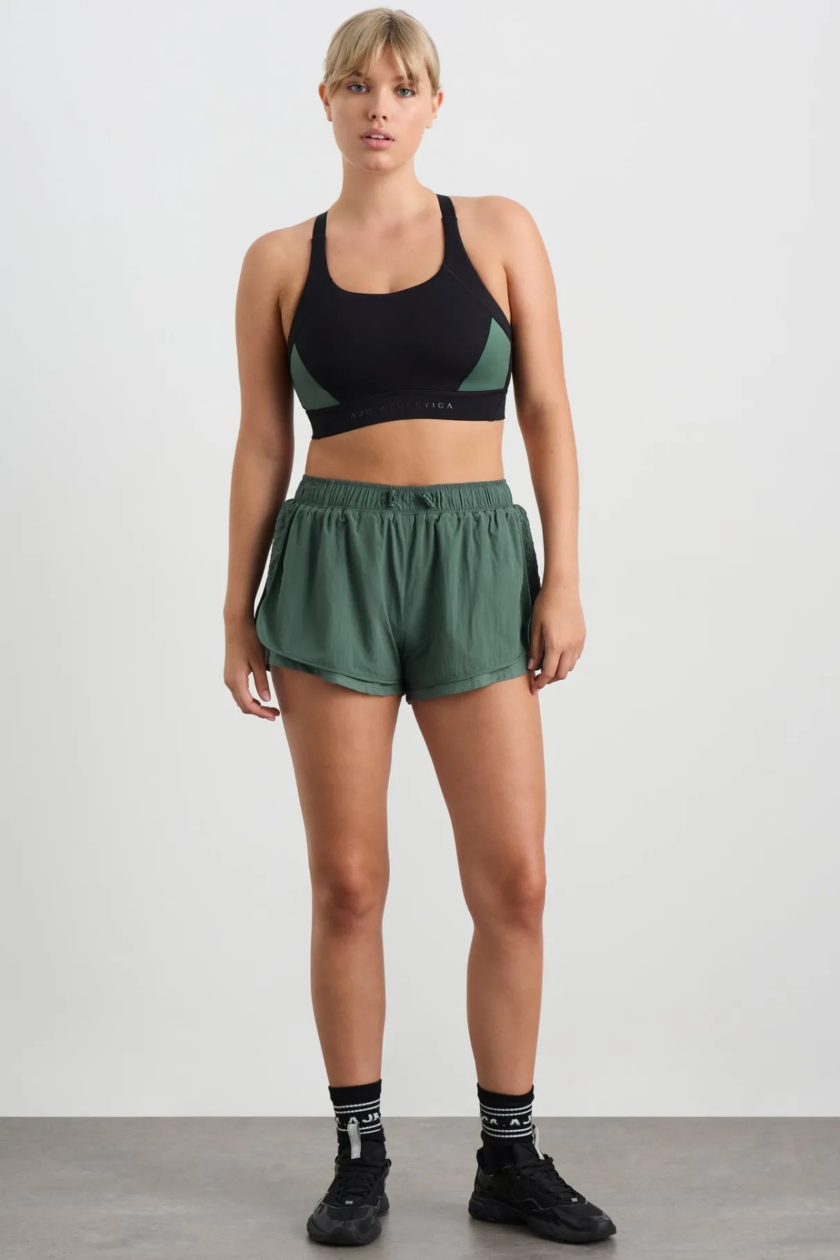 perforated_spray_shorts__6.webp Shop Aje ATHLETICA Perforated Spray Shorts 019 Moss Green