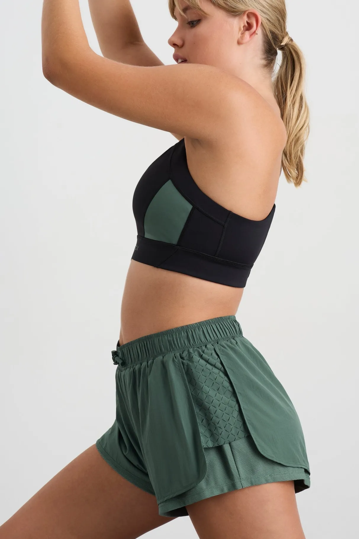 perforated_spray_shorts__9.webp Shop Aje ATHLETICA Perforated Spray Shorts 019 Moss Green