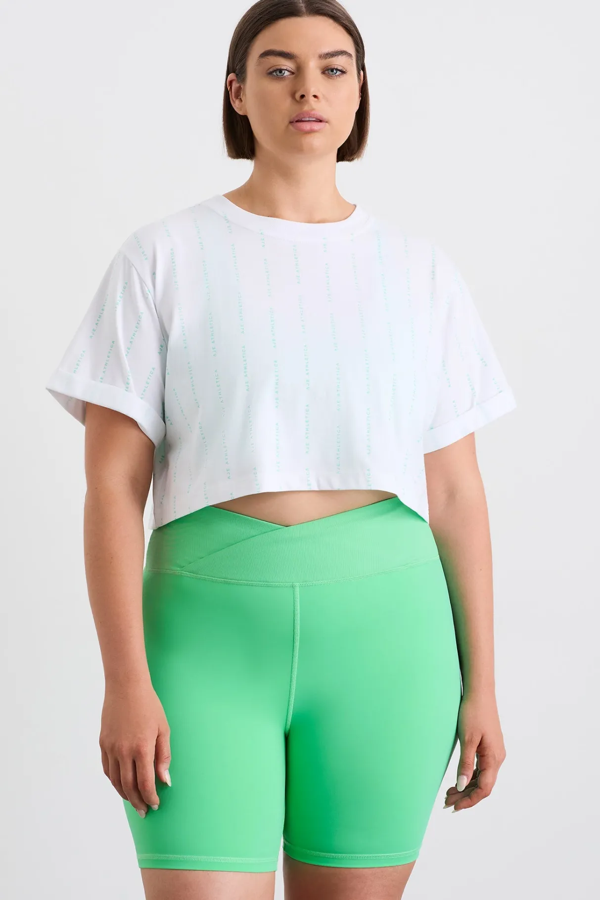 pinstripe_crop_tee__14-1.webp Store Aje ATHLETICA Pinstripe Crop Tee 105 White Marine Green