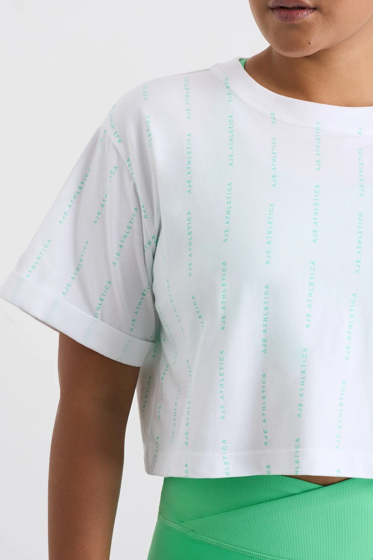 pinstripe_crop_tee__8-1.webp Store Aje ATHLETICA Pinstripe Crop Tee 105 White Marine Green