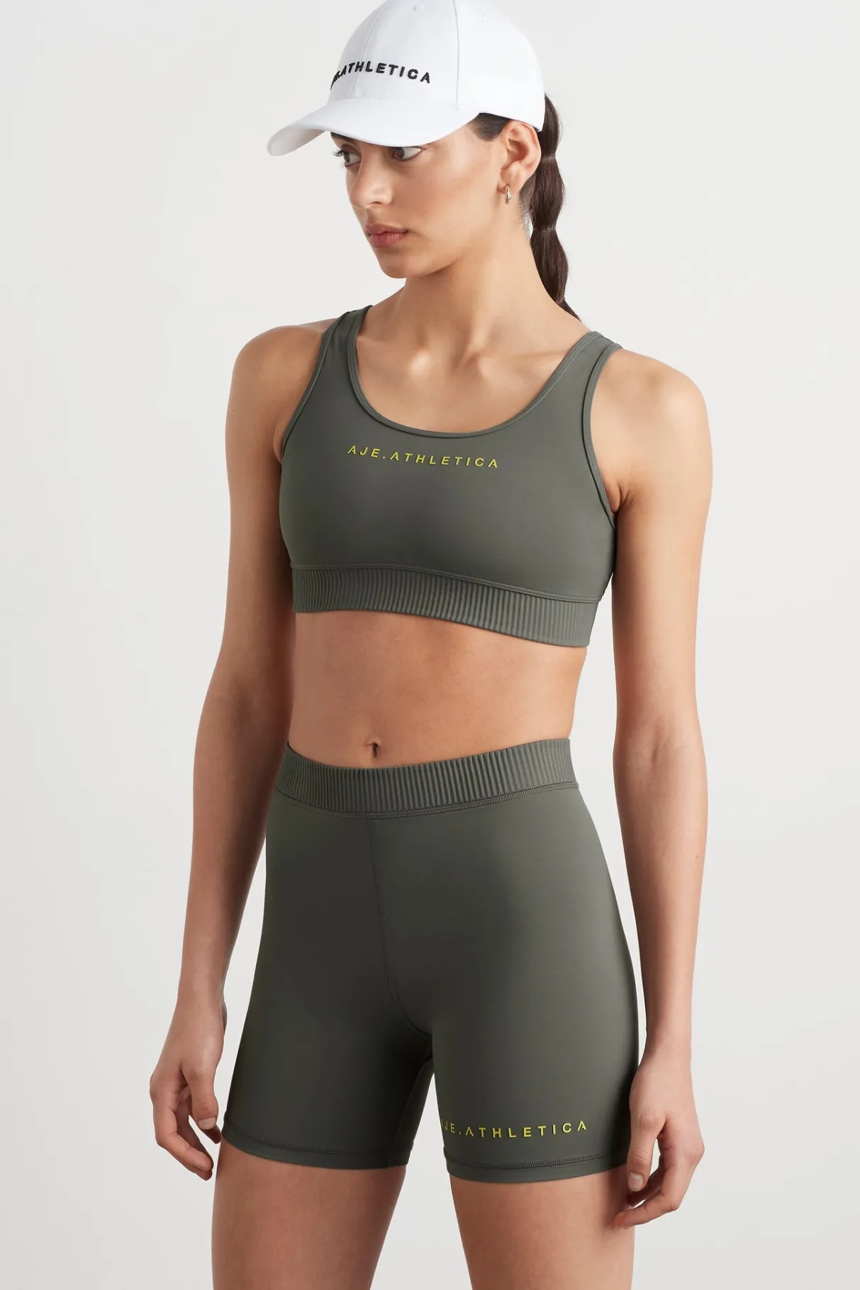 pintuck_effect_sports_bra__0.webp Clearance Aje ATHLETICA Pintuck Effect Sports Bra 327 Midnight Grey/Citrus Yellow