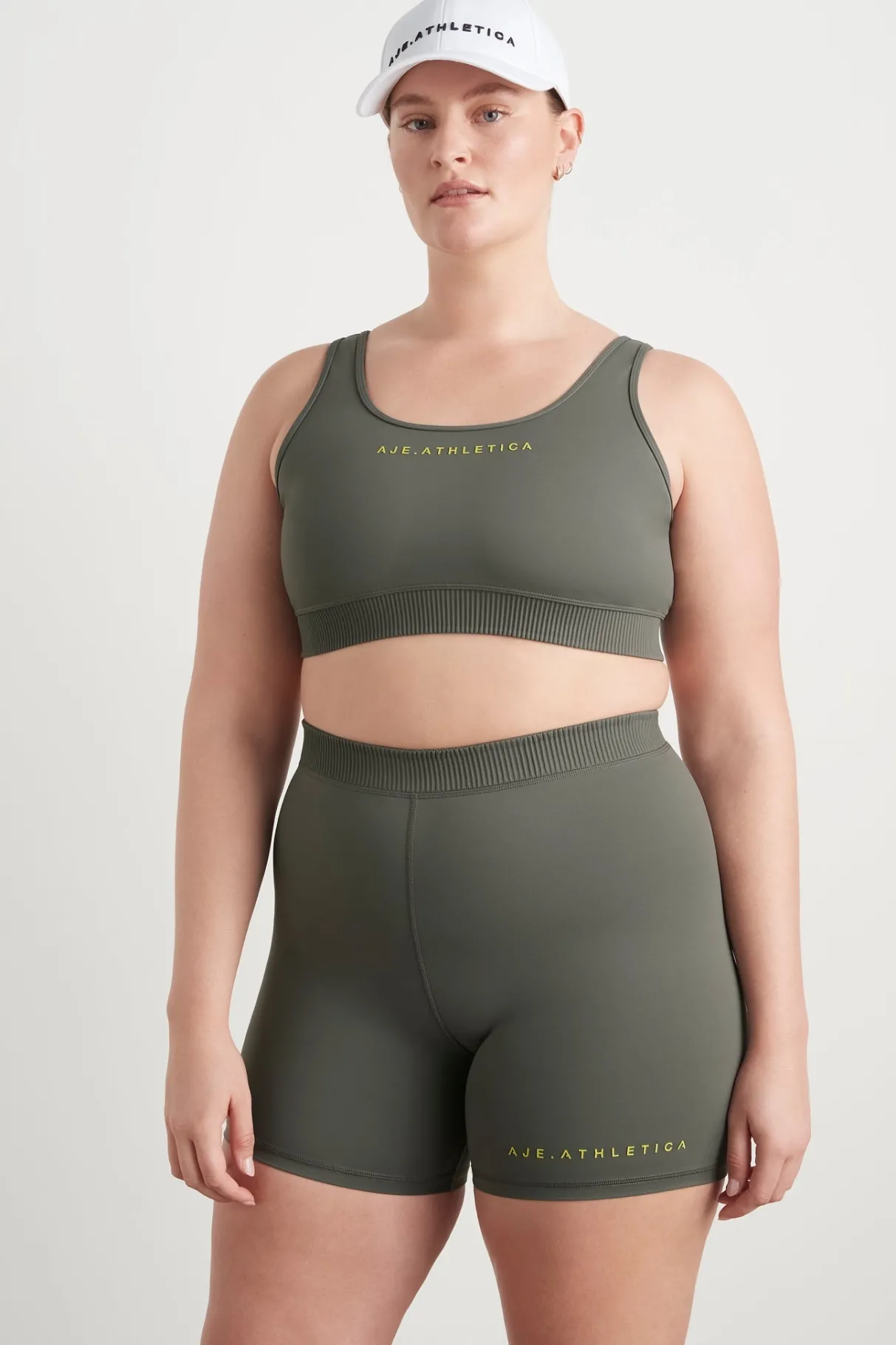 pintuck_effect_sports_bra__11.webp Clearance Aje ATHLETICA Pintuck Effect Sports Bra 327 Midnight Grey/Citrus Yellow