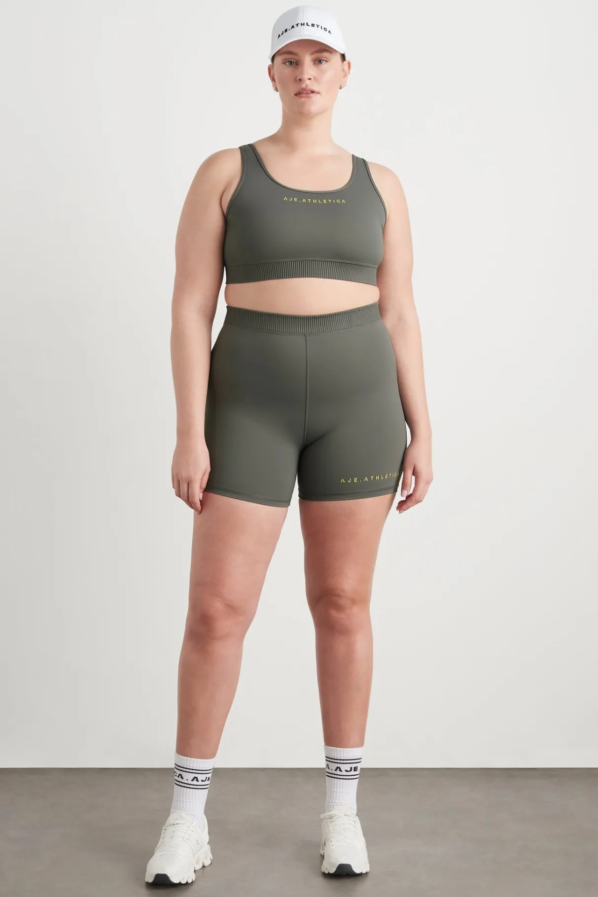 pintuck_effect_sports_bra__12.webp Clearance Aje ATHLETICA Pintuck Effect Sports Bra 327 Midnight Grey/Citrus Yellow
