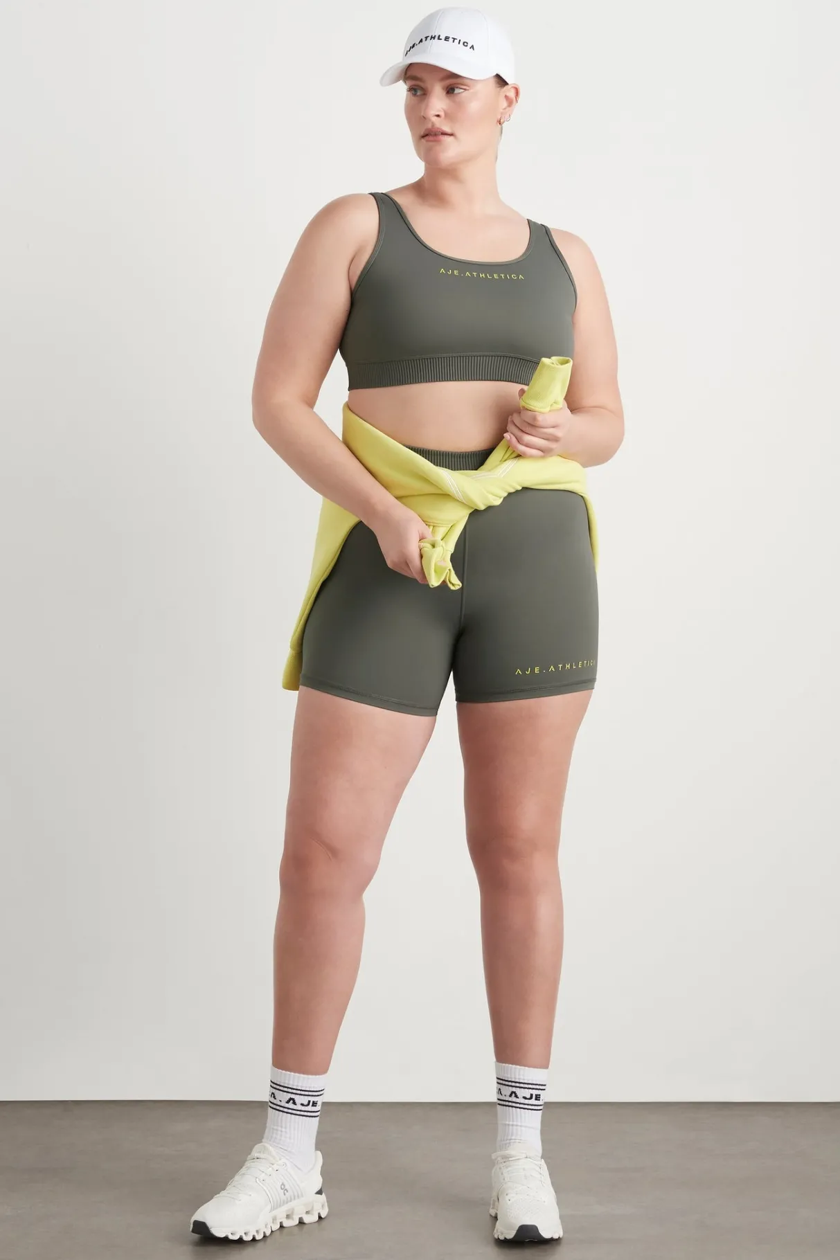 pintuck_effect_sports_bra__16.webp Clearance Aje ATHLETICA Pintuck Effect Sports Bra 327 Midnight Grey/Citrus Yellow