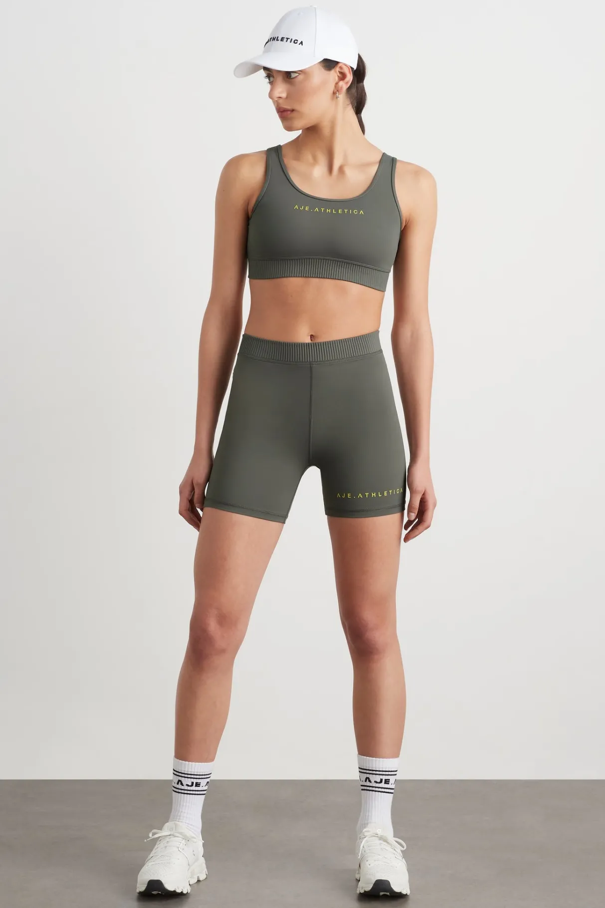 pintuck_effect_sports_bra__2.webp Clearance Aje ATHLETICA Pintuck Effect Sports Bra 327 Midnight Grey/Citrus Yellow