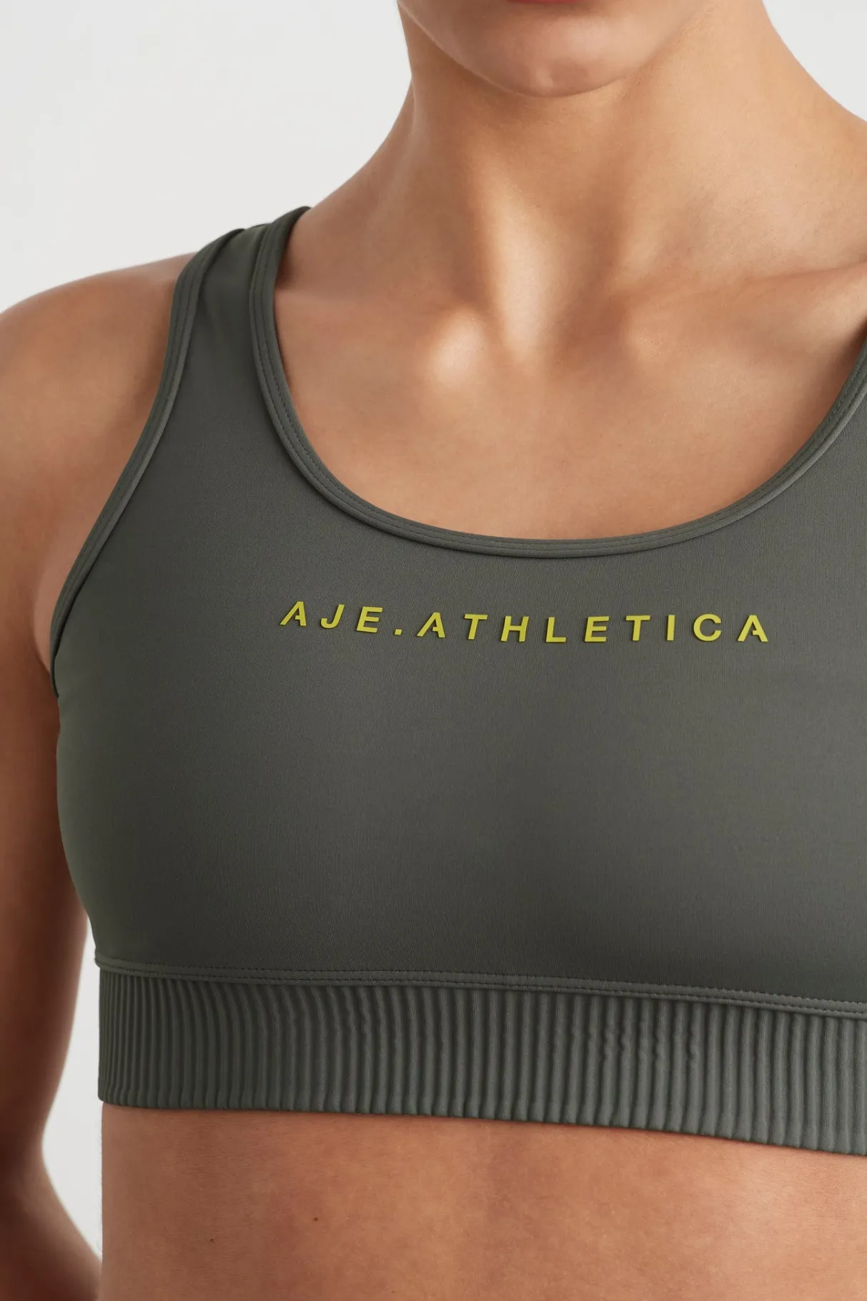 pintuck_effect_sports_bra__3.webp Clearance Aje ATHLETICA Pintuck Effect Sports Bra 327 Midnight Grey/Citrus Yellow