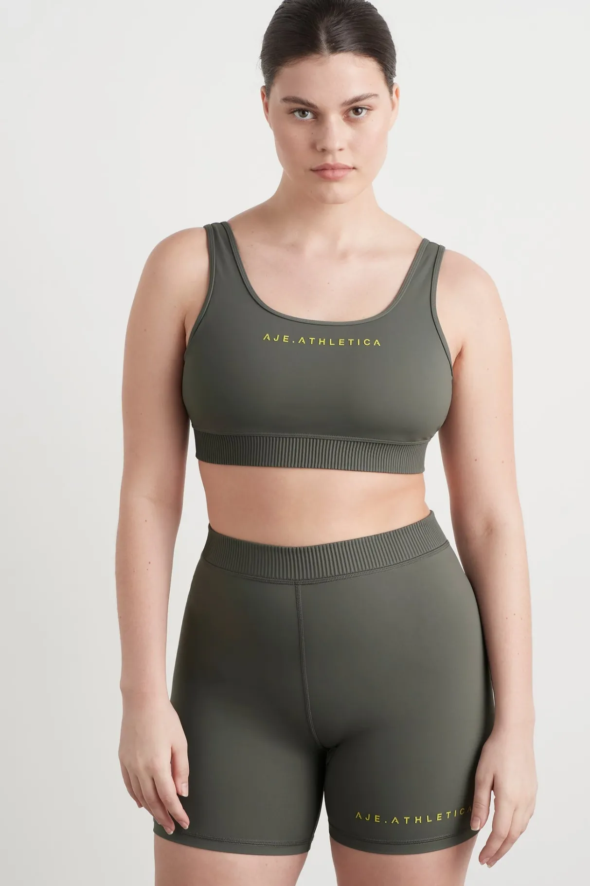 pintuck_effect_sports_bra__5.webp Clearance Aje ATHLETICA Pintuck Effect Sports Bra 327 Midnight Grey/Citrus Yellow