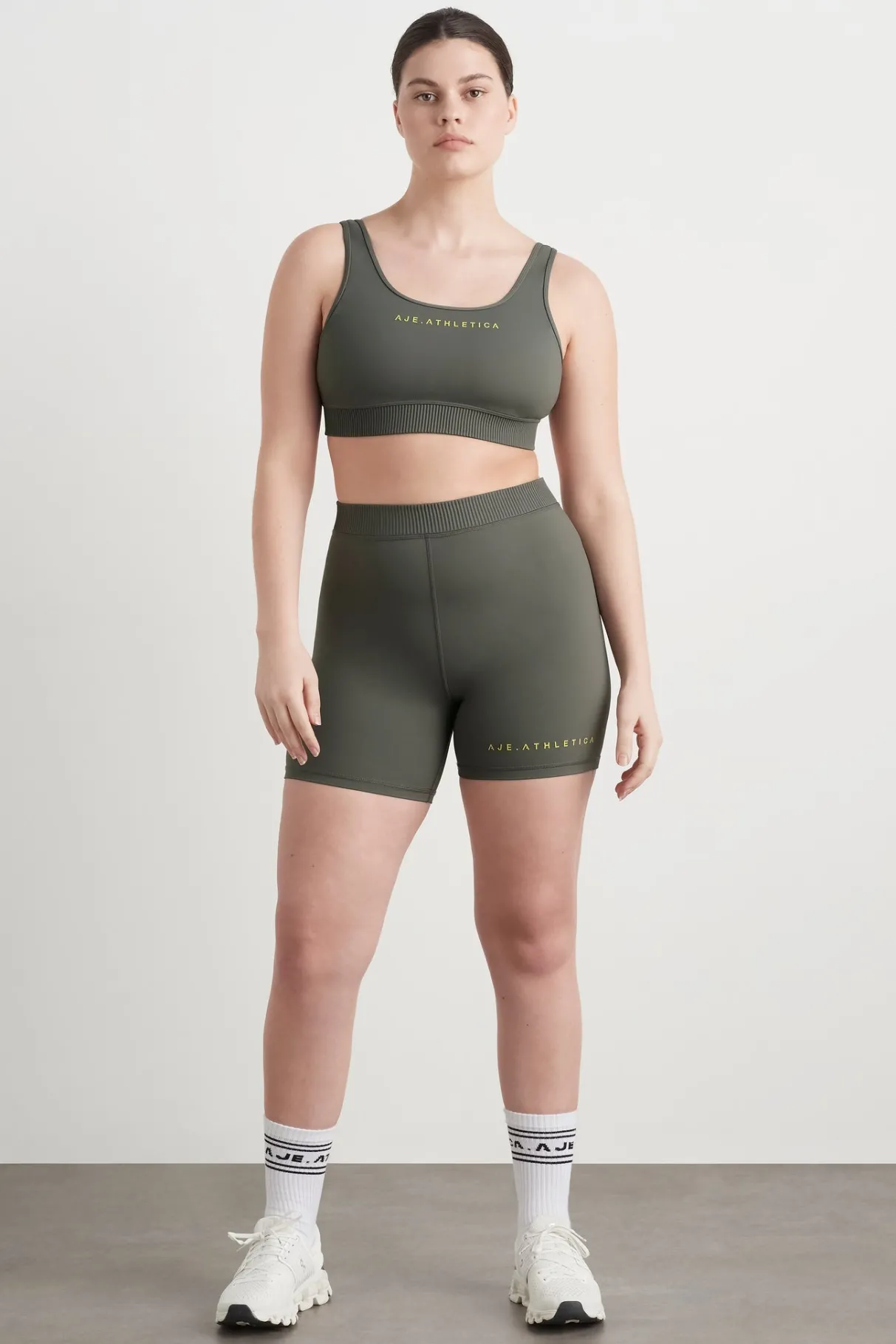 pintuck_effect_sports_bra__6.webp Clearance Aje ATHLETICA Pintuck Effect Sports Bra 327 Midnight Grey/Citrus Yellow