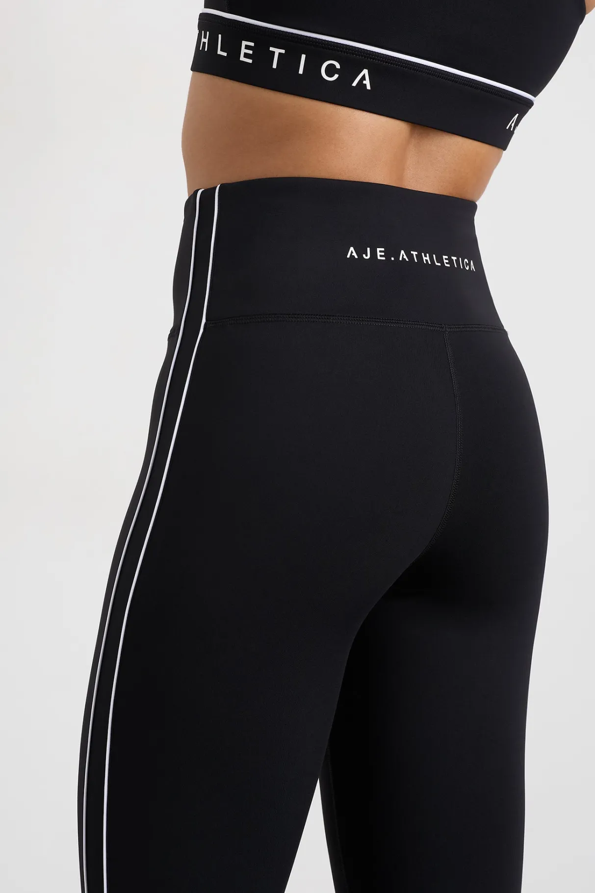 piped_side_ankle_length_legging__3.webp Online Aje ATHLETICA Piped Side Ankle Length Legging 299 Black