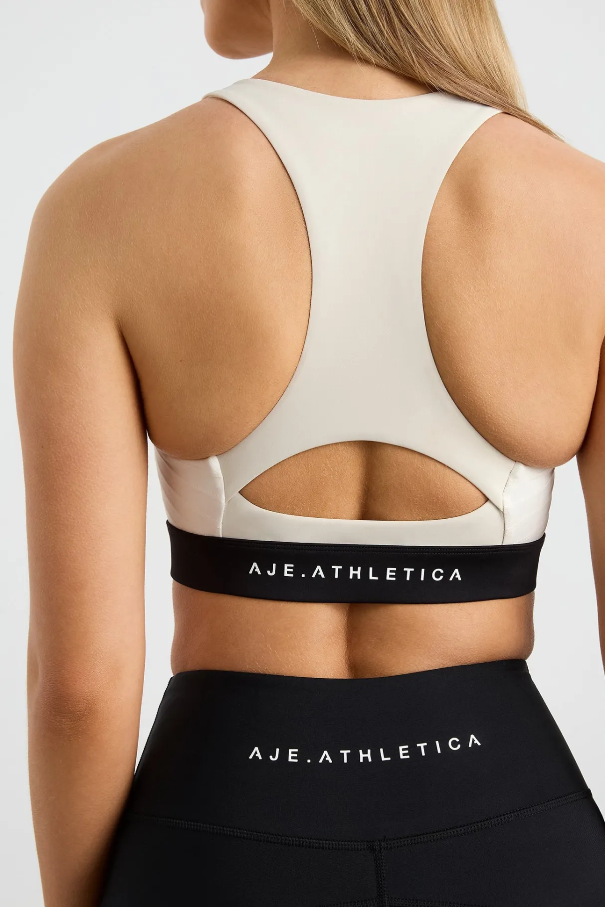 quilted_zip_front_bra__4.webp New Aje ATHLETICA Quilted Zip Front Bra 304 Moonstone Grey / Ecru / Black