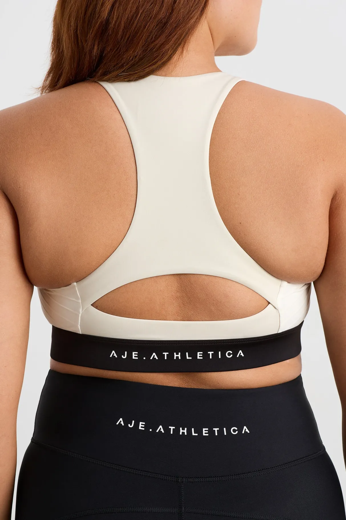 quilted_zip_front_bra__8.webp New Aje ATHLETICA Quilted Zip Front Bra 304 Moonstone Grey / Ecru / Black
