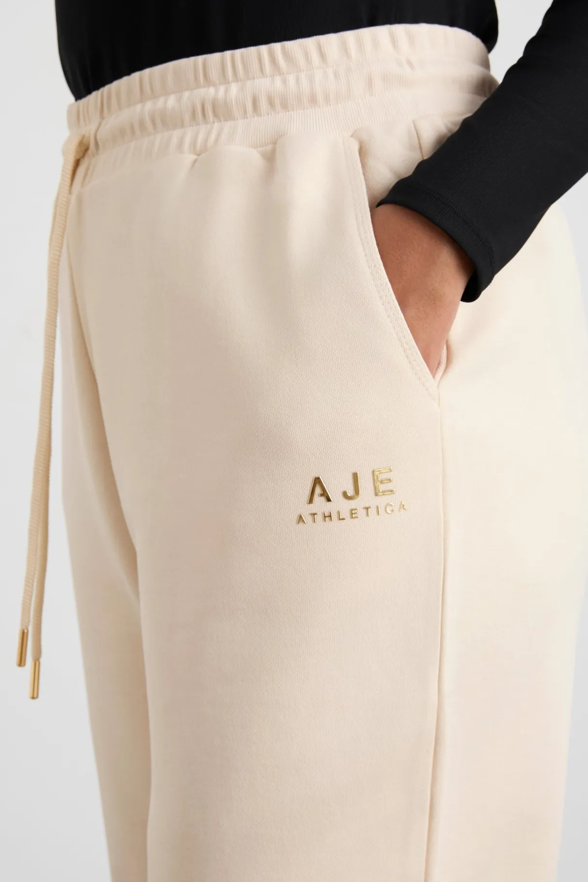 relaxed_track_pants__4-1.webp Shop Aje ATHLETICA Relaxed Track Pants 508 Rice White