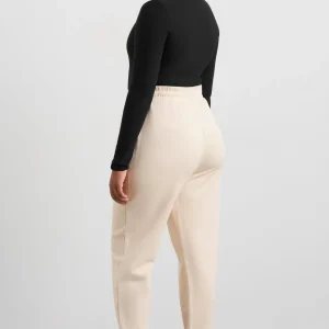 Shop Aje ATHLETICA Relaxed Track Pants 508 Rice White