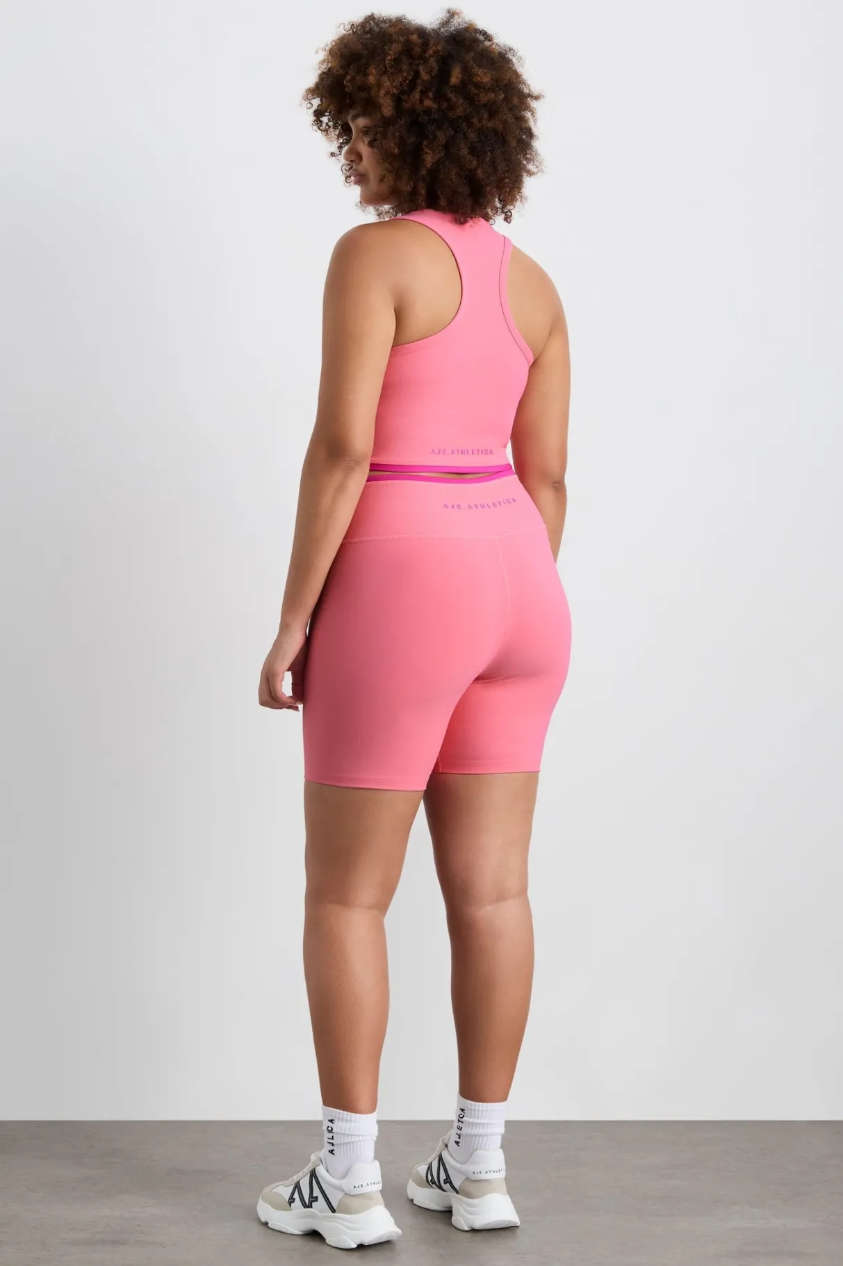 ribbed_mid_length_bike_short__12.webp Sale Aje ATHLETICA Ribbed Mid Length Bike Short 601 Deep Blush