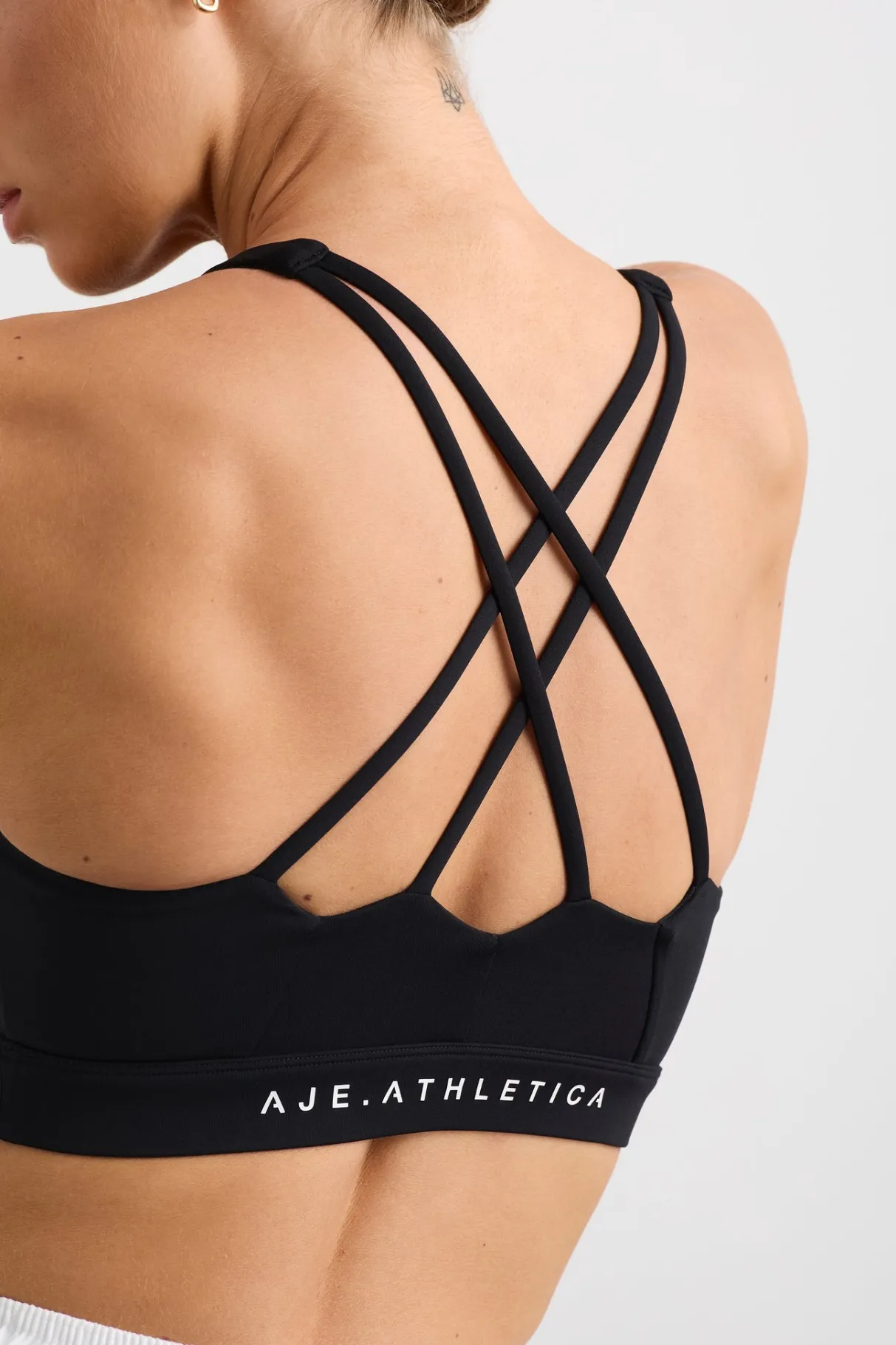 ruched_crossback_bra__0-1.webp Store Aje ATHLETICA Ruched Crossback Bra 353 Black