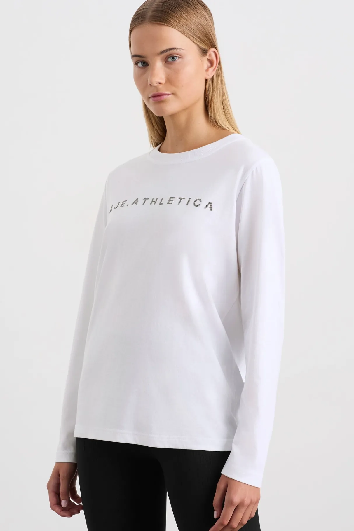 signature_logo_long_sleeve_tshirt__0.webp Shop Aje ATHLETICA Signature Logo Long Sleeve T-Shirt 127 White/Herringbone
