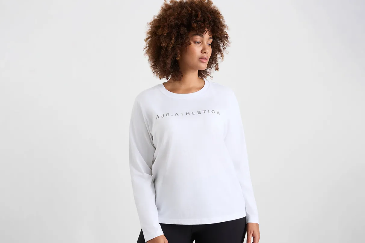 signature_logo_long_sleeve_tshirt__13.webp Shop Aje ATHLETICA Signature Logo Long Sleeve T-Shirt 127 White/Herringbone