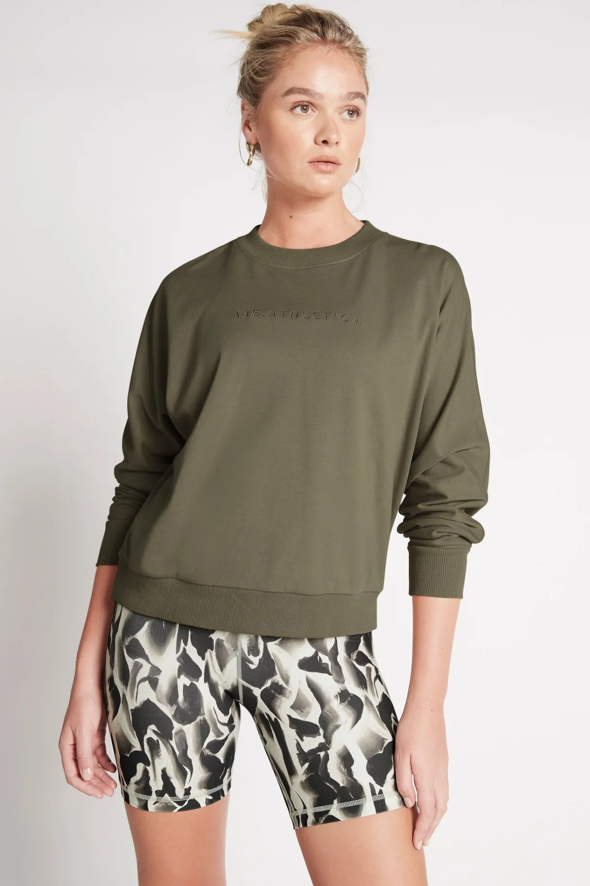 signature_logo_sweatshirt__0-1.webp Shop Aje ATHLETICA Signature Logo Sweatshirt 122 Forest Green