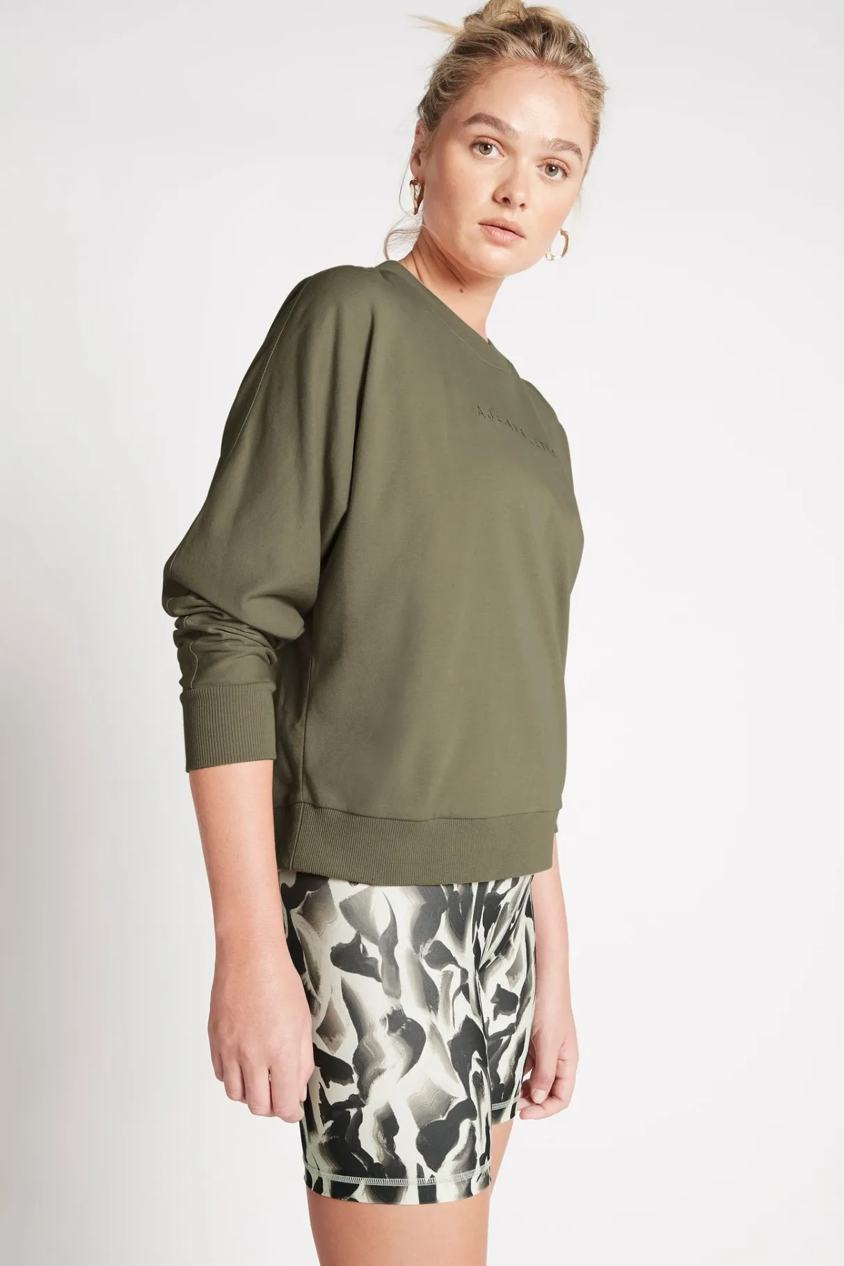 signature_logo_sweatshirt__2-1.webp Shop Aje ATHLETICA Signature Logo Sweatshirt 122 Forest Green