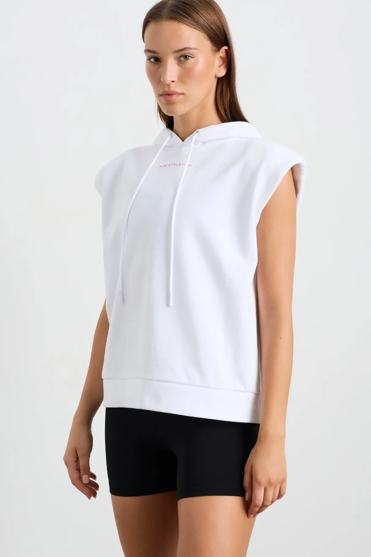 sleeveless_logo_hoodie__0.webp Online Aje ATHLETICA Sleeveless Logo Hoodie 402 White/Pink