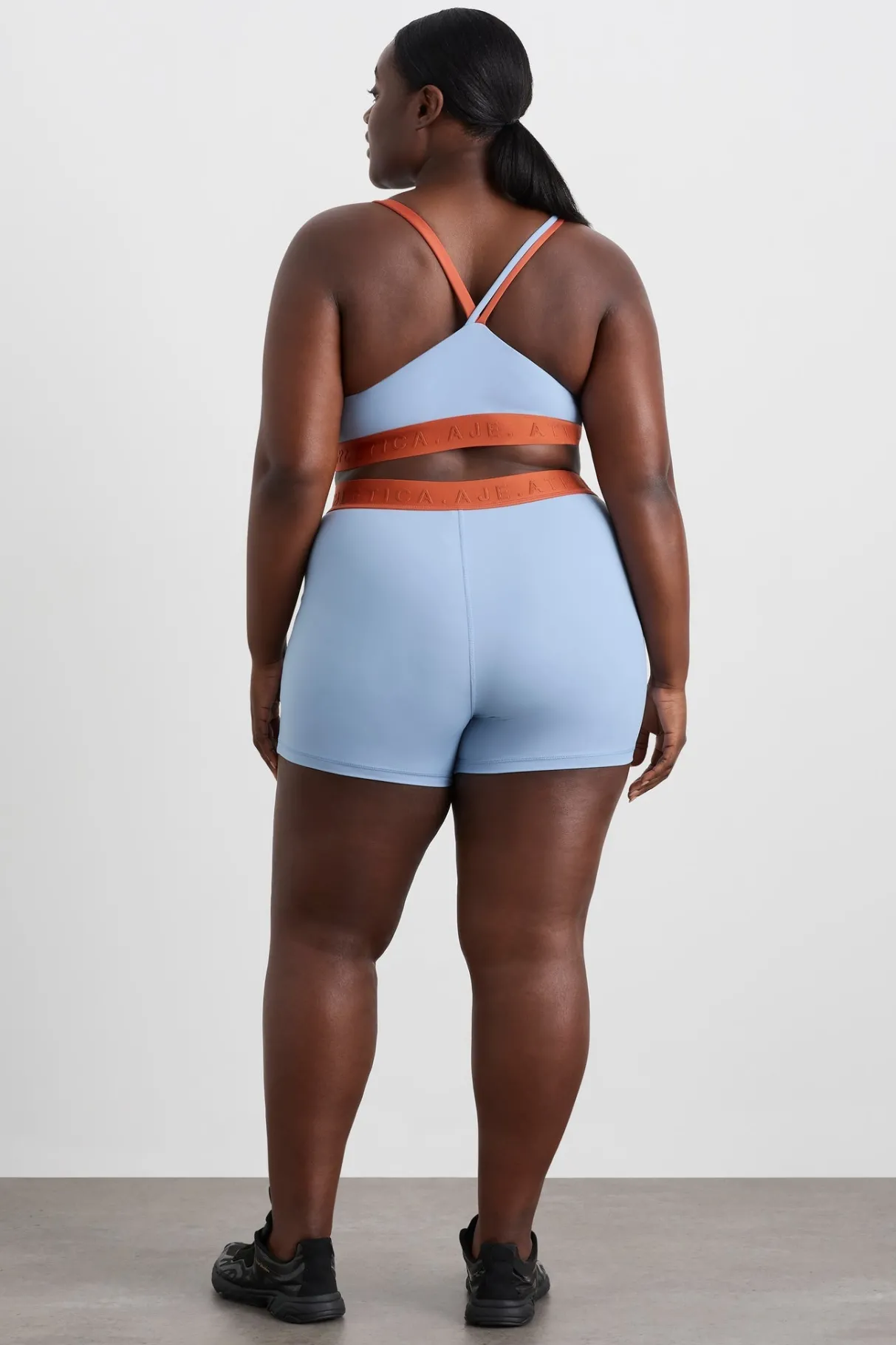 split_strap_logo_bra__16.webp Hot Aje ATHLETICA Split Strap Logo Bra 366 Steel Blue Copper Orange