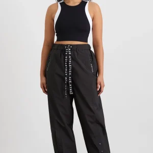 Shop Aje ATHLETICA Spray Pants 505 Black