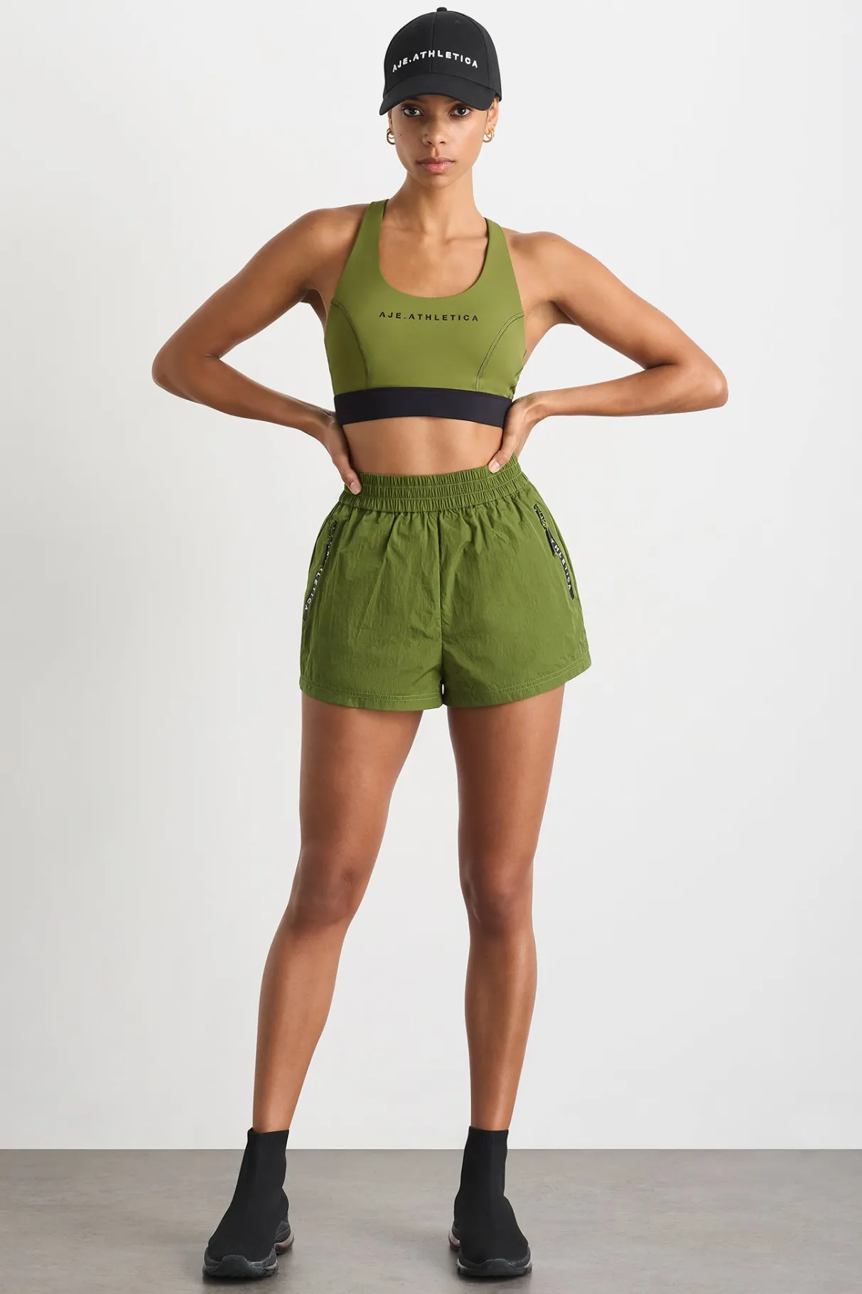 spray_short__0.webp Sale Aje ATHLETICA Spray Short 620 Evergreen