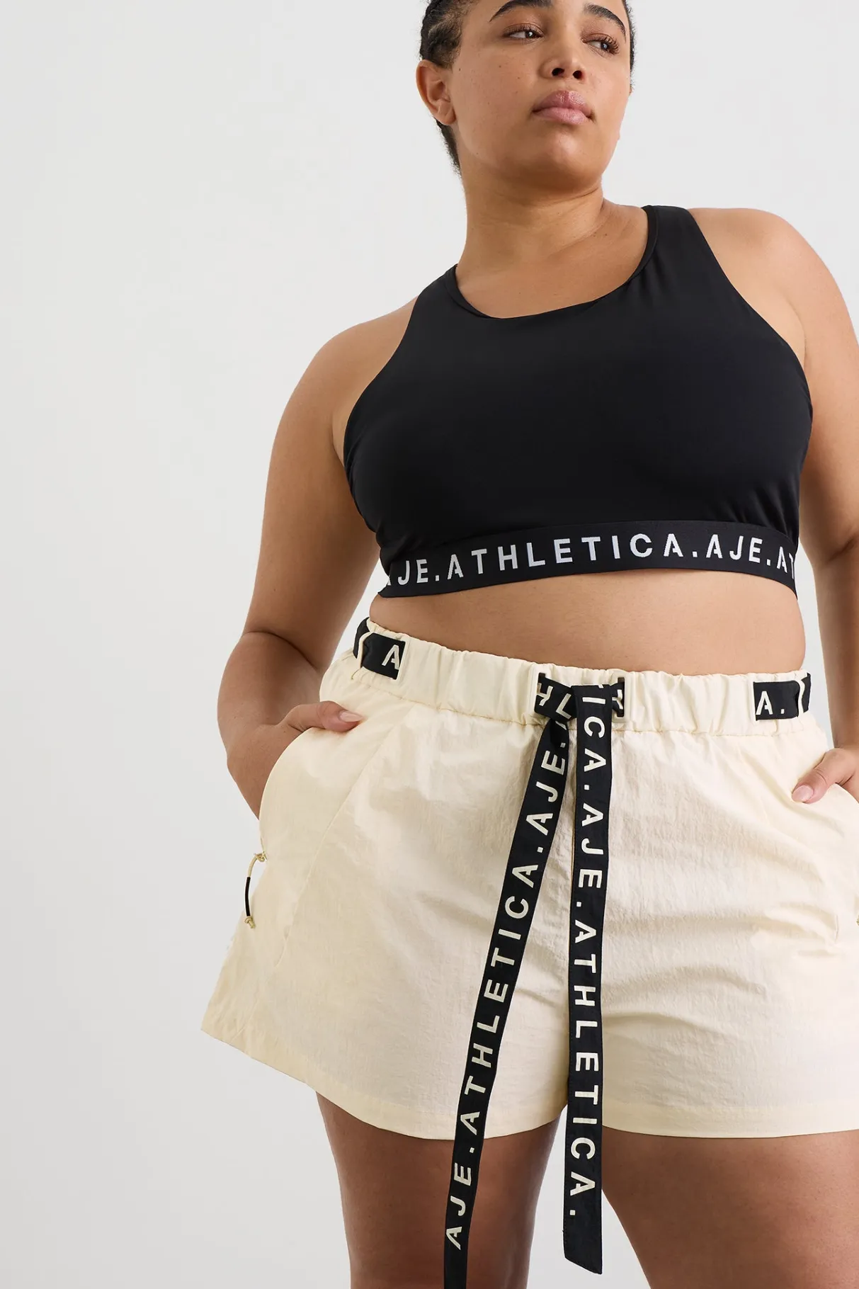 spray_shorts__13.webp New Aje ATHLETICA Spray Shorts 608 Limestone Beige Black