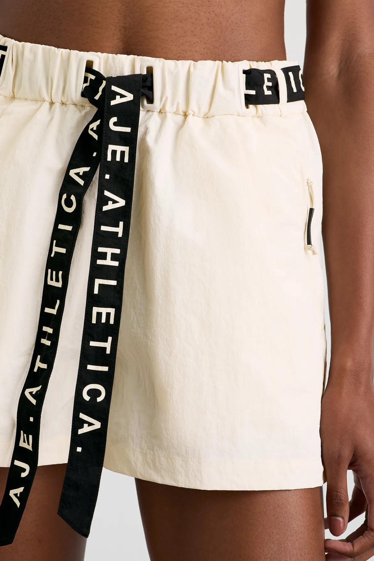 spray_shorts__3-2.webp New Aje ATHLETICA Spray Shorts 608 Limestone Beige Black