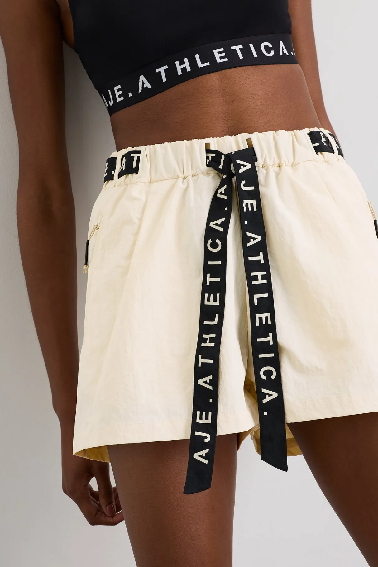 spray_shorts__4-2.webp New Aje ATHLETICA Spray Shorts 608 Limestone Beige Black