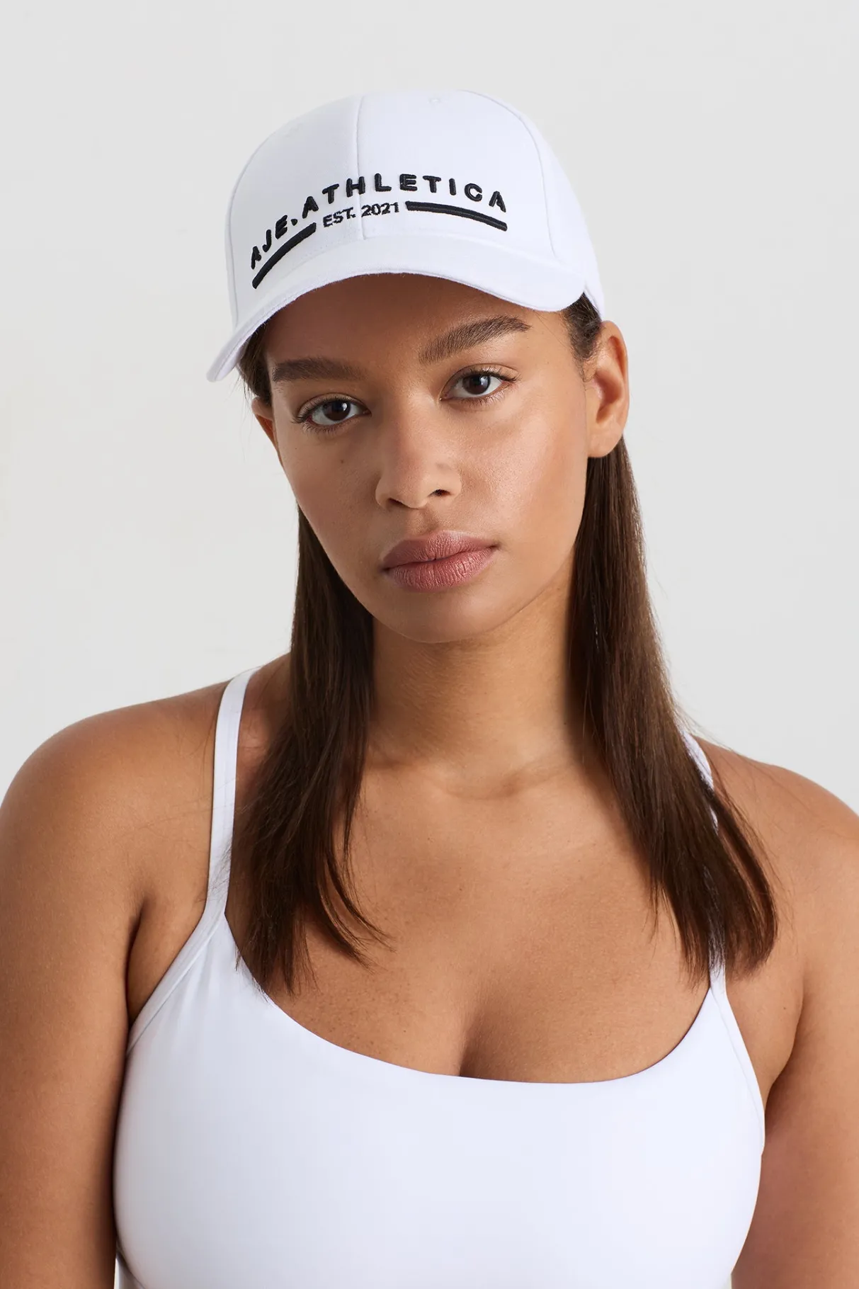 stacked_logo_cap__0.webp Best Aje ATHLETICA Stacked Logo Cap 901 White/Black Logo